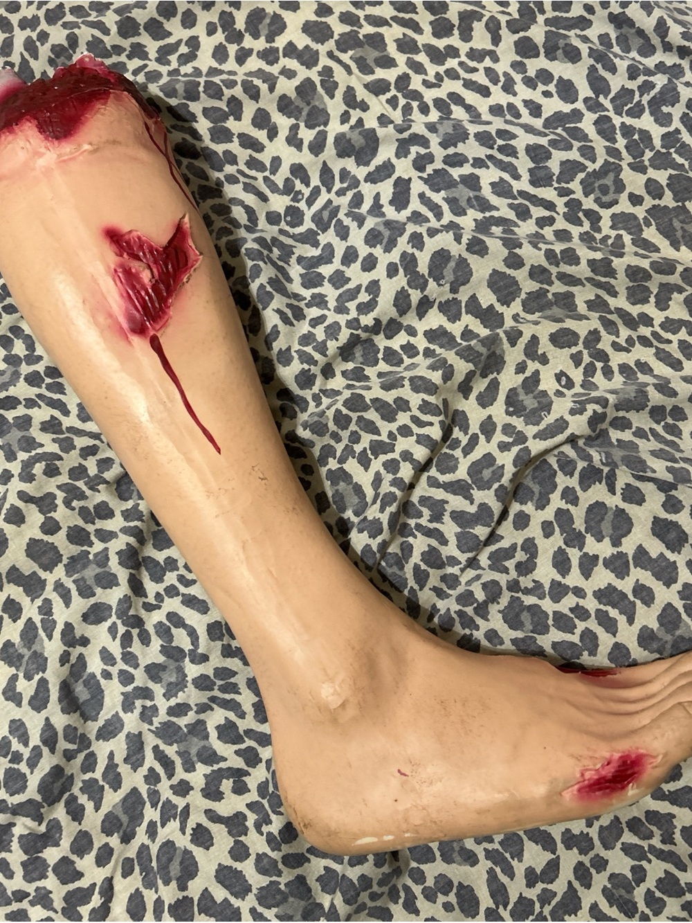 Source Unknown Flesh-Tone Prosthetic Leg with Red Wound Detail
